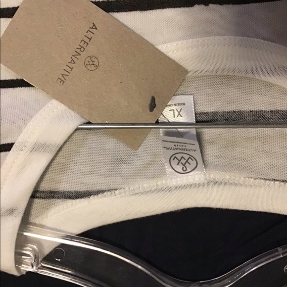 White t-shirt with black stripes. - Picture 2 of 3